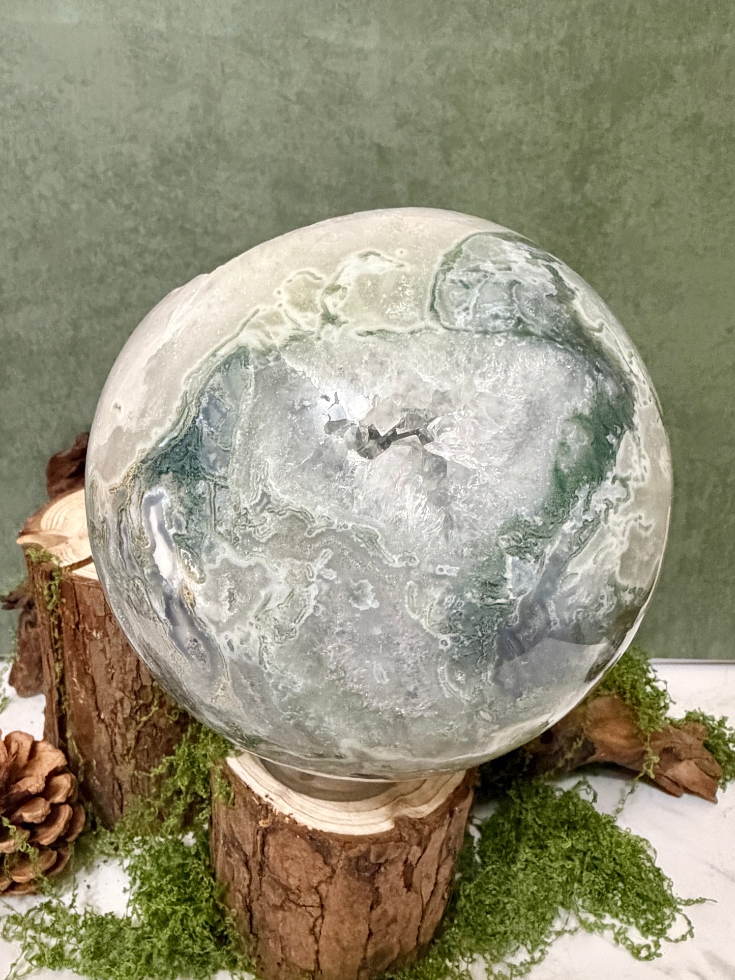 XLG moss agate sphere with druzy pockets